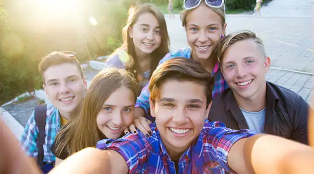 group of teens with straight teeth